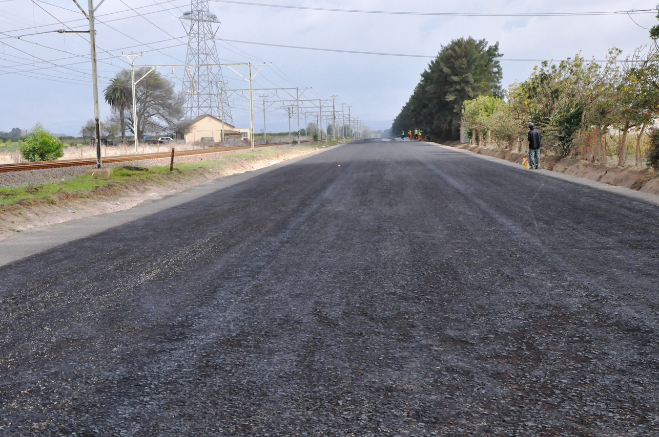 Almost half of the road has been surfaced.