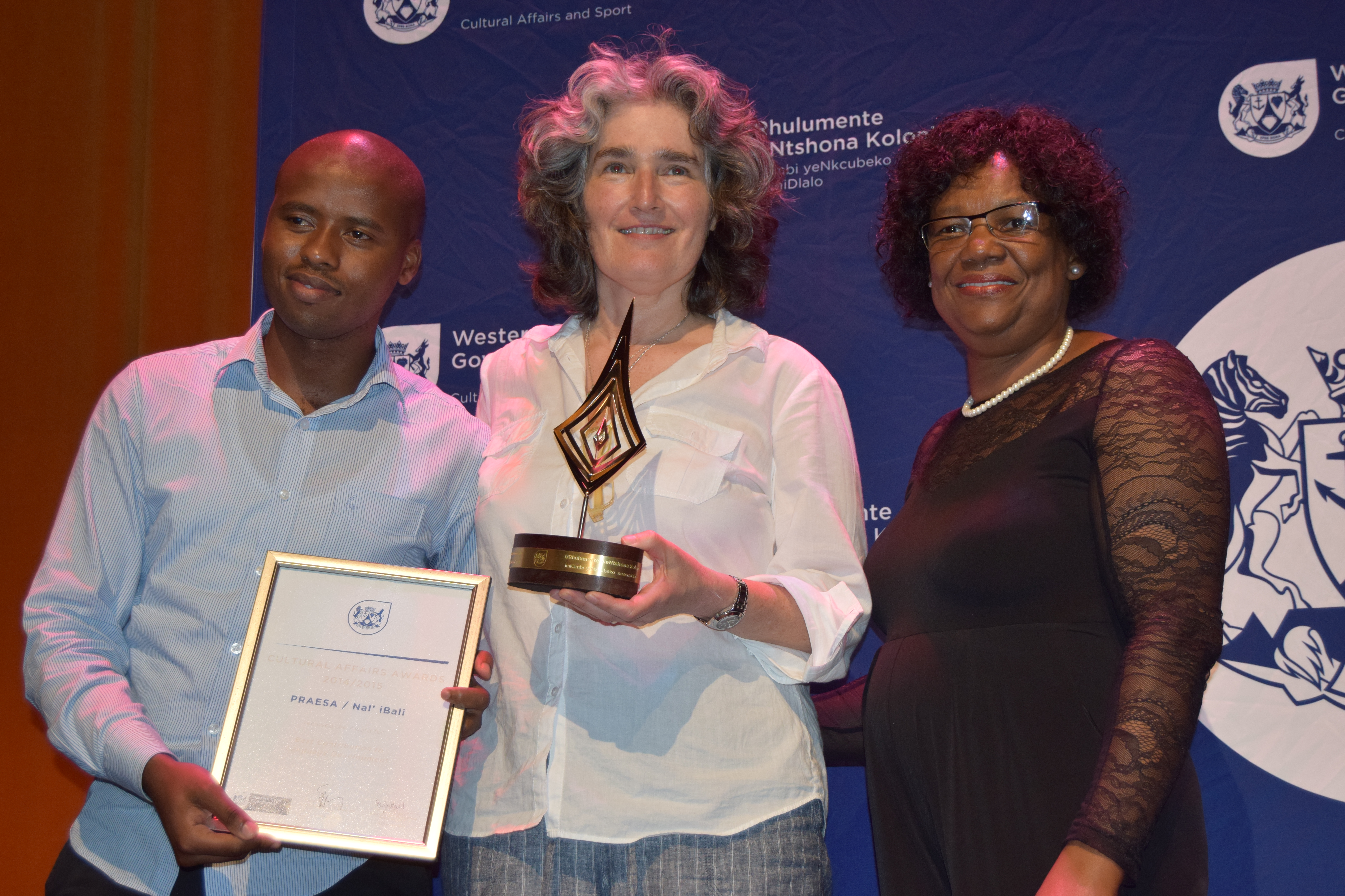 Representatives from PRAESA/Nal’iBali accepting an award for Best Contribution to Language Development from Jane Moleleki