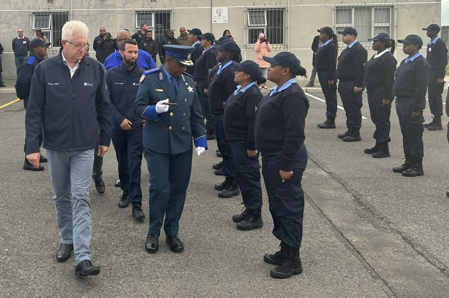 Premier Alan Winde, (left front) and Western Cape Minister of Police Oversight and Community Safety, Reagen Allen (right back)