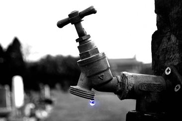 Water Dripping from Tap