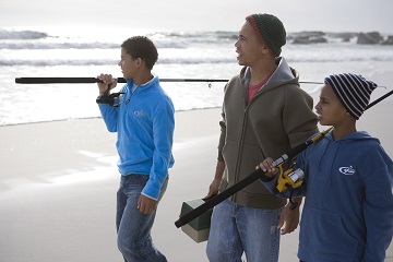 Father fishing with sons