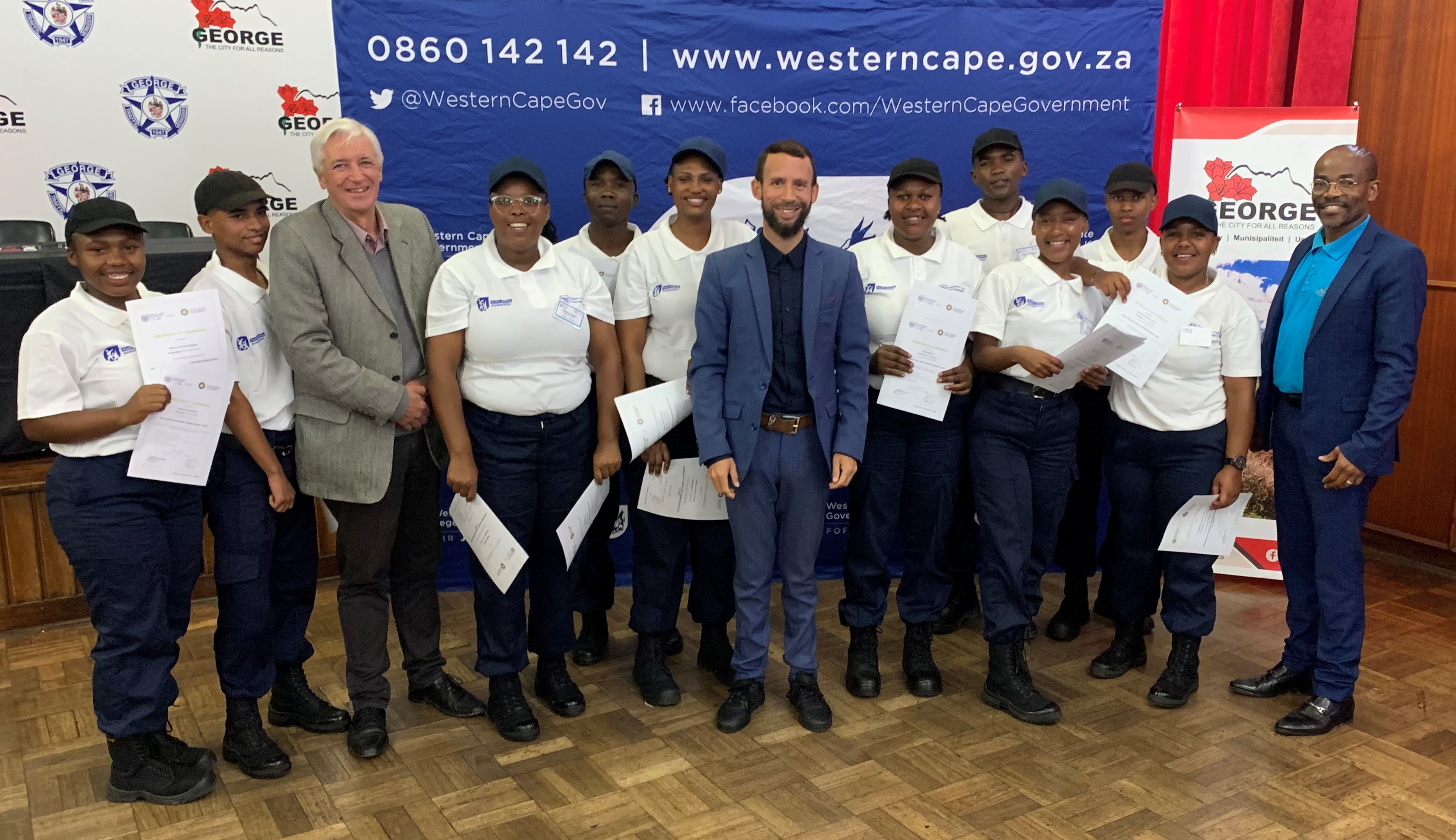 Gentlemen in suits, L – R: George Executive Mayor, Alderman Leon Van Wyk, Western Cape Minister of Police Oversight and Community Safety, Reagen Allen and Garden Route District Executive Mayor, Alderman Memory Booysen.