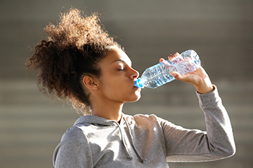 girl-drinking-bottled-water