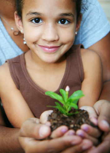 Girl planting a tree