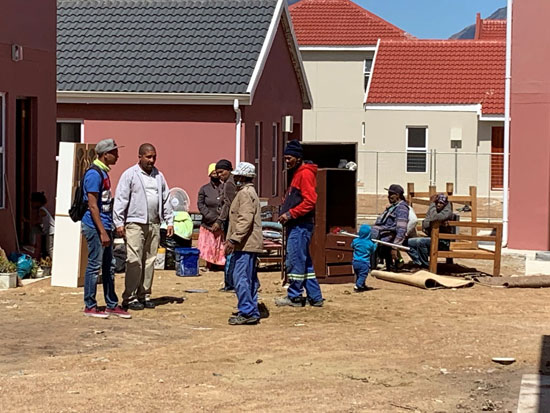 Vlakkeland residents moving in to their homes