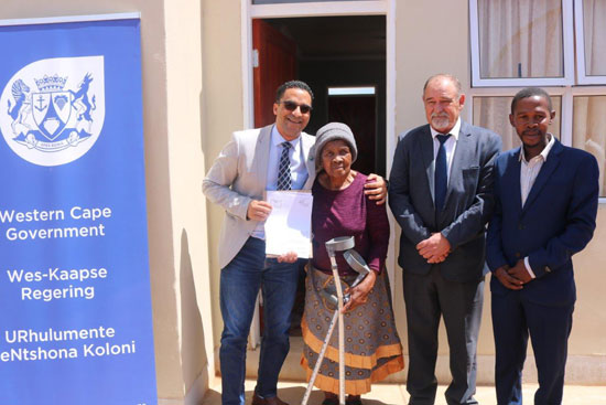 L-R: Minister Simmers, Mrs. Dikasi Luwalala, Executive Mayor Schalk van Eeden and Councillor Lungani Gxowa