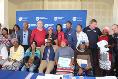 Kleinmond Resident Receives Title Deeds From Minister Madikizela