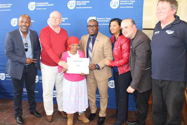 Kleinmond Resident Receives Title Deeds From Minister Madikizela