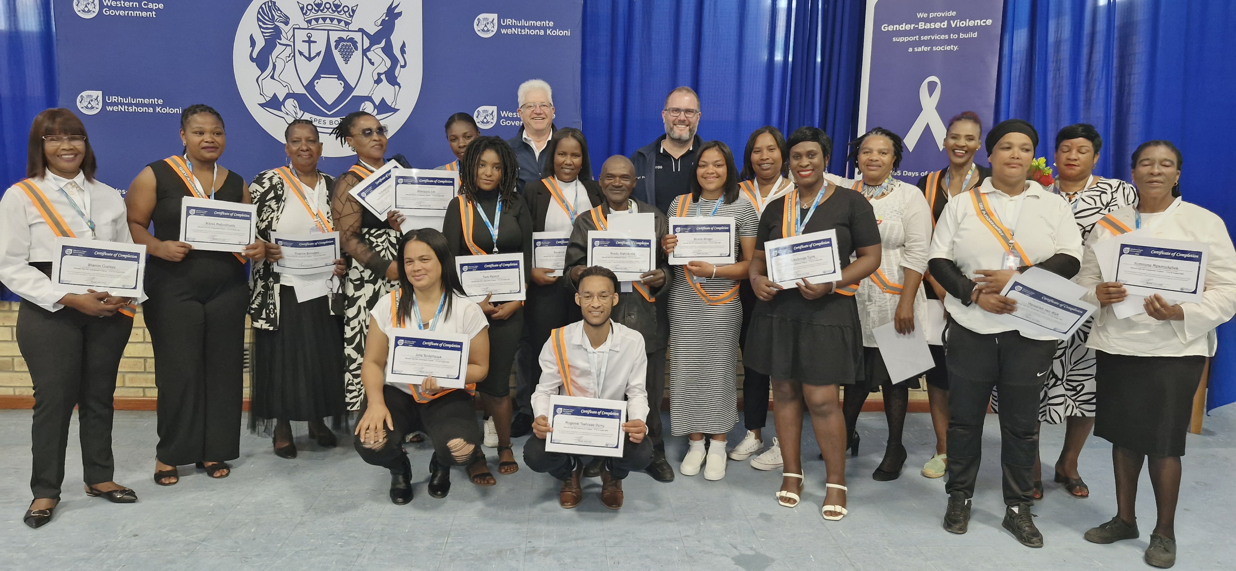 Premier Alan Winde and Western Cape Minister of Social Development, Jaco Londt, with the Heinz Park GBV Ambassadors