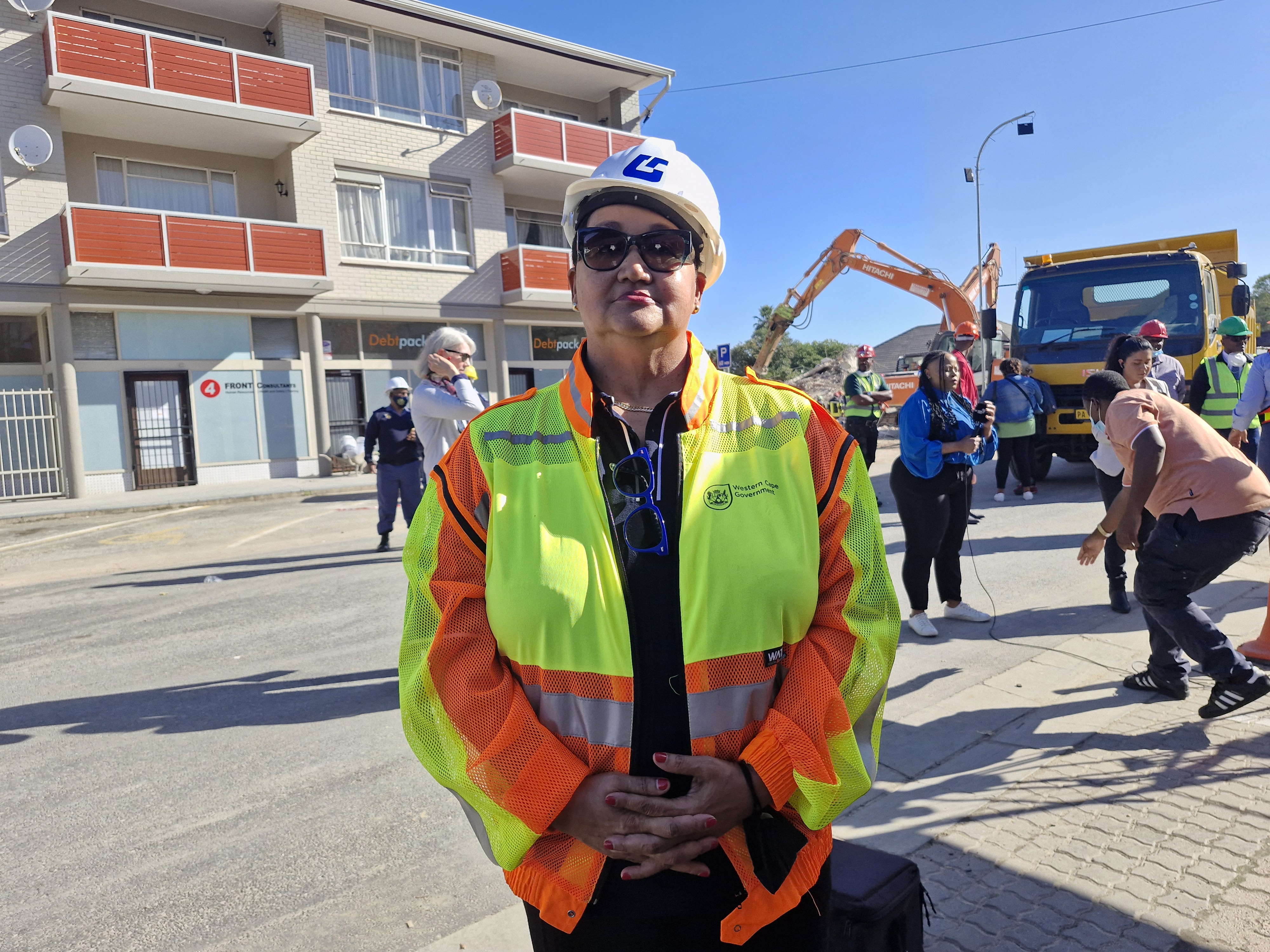 MEC Sharna Fernandez at the site of the building collapse