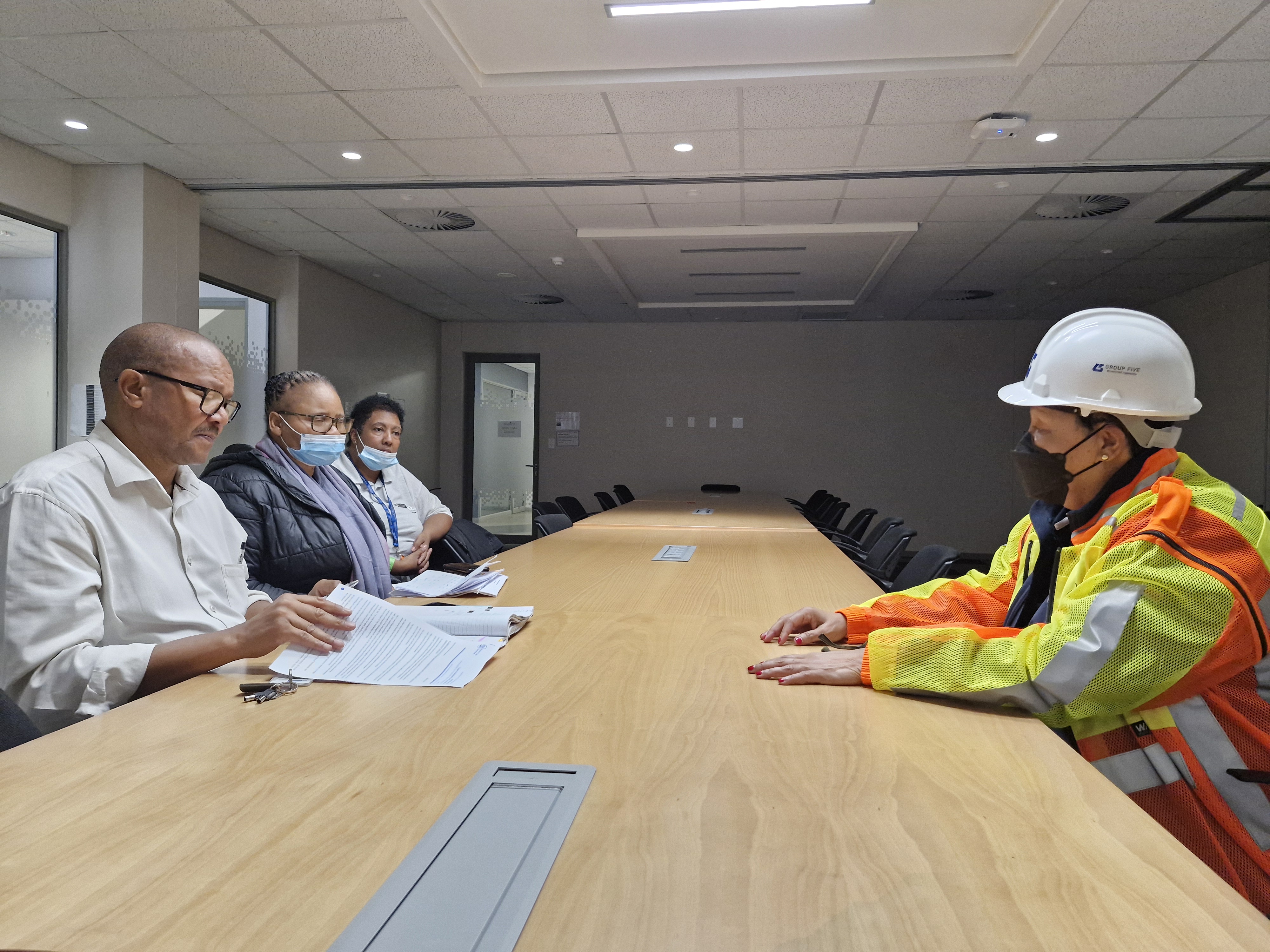 MEC Sharna Fernandez speaking to George DSD officials (L to R): Mzukisi Skosana (Social Work Manager), Nolubabalo Ntliziywana Batakati (Social Work Supervisor) and Ingrid Phooko (Social Work Supervisor)