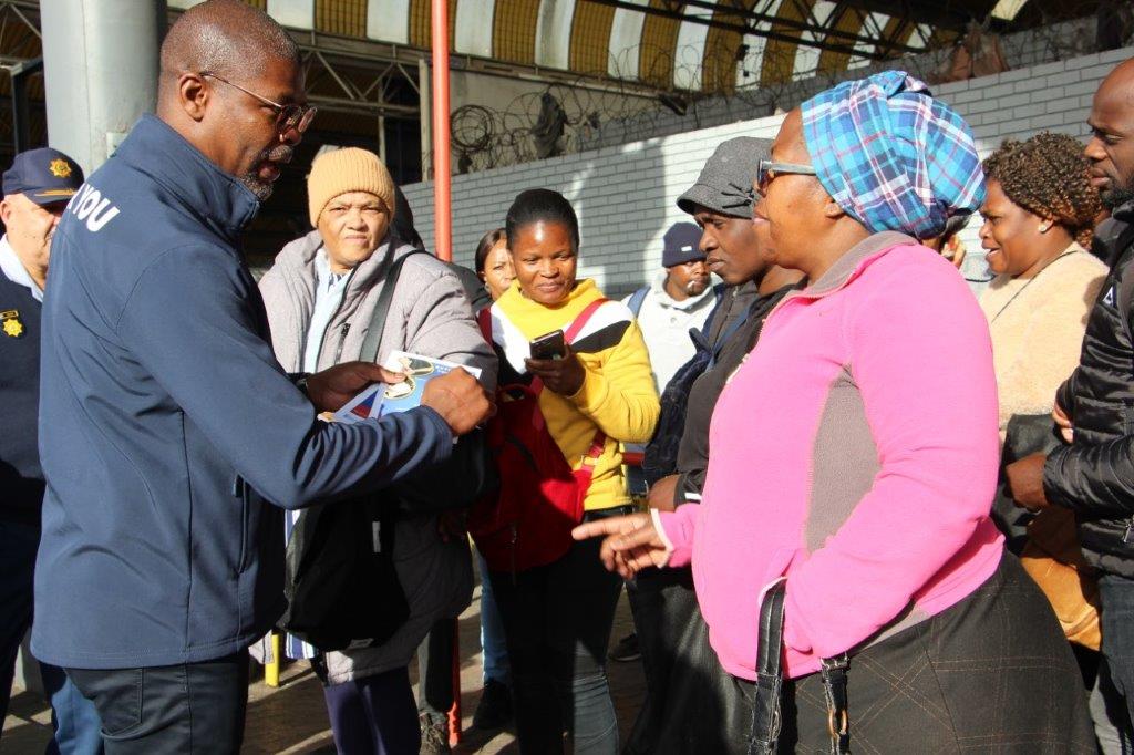 Minister Isaac Sileku speaks to commuters at the launch of October Mobility Month