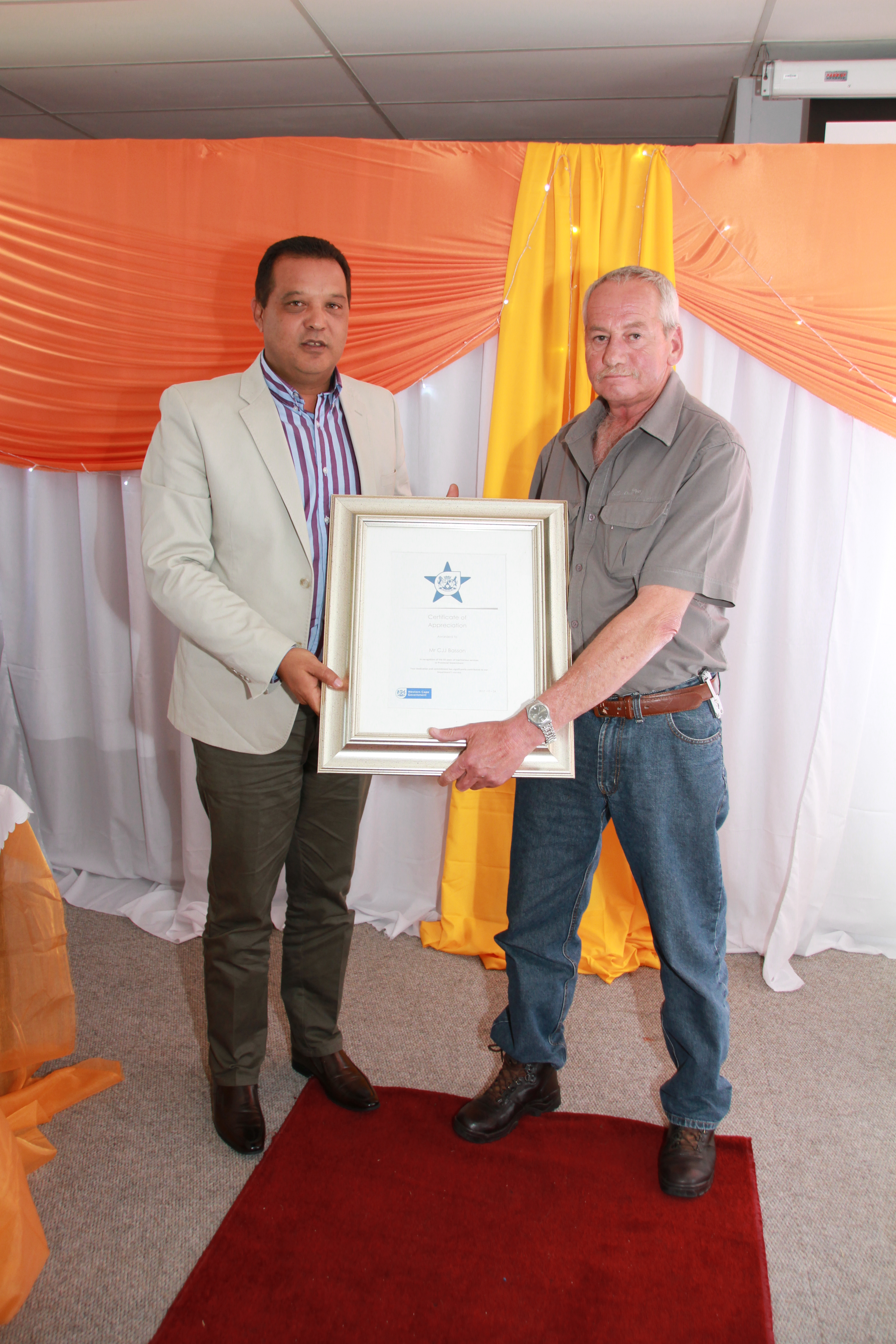 Handing Over Certificate to J Basson