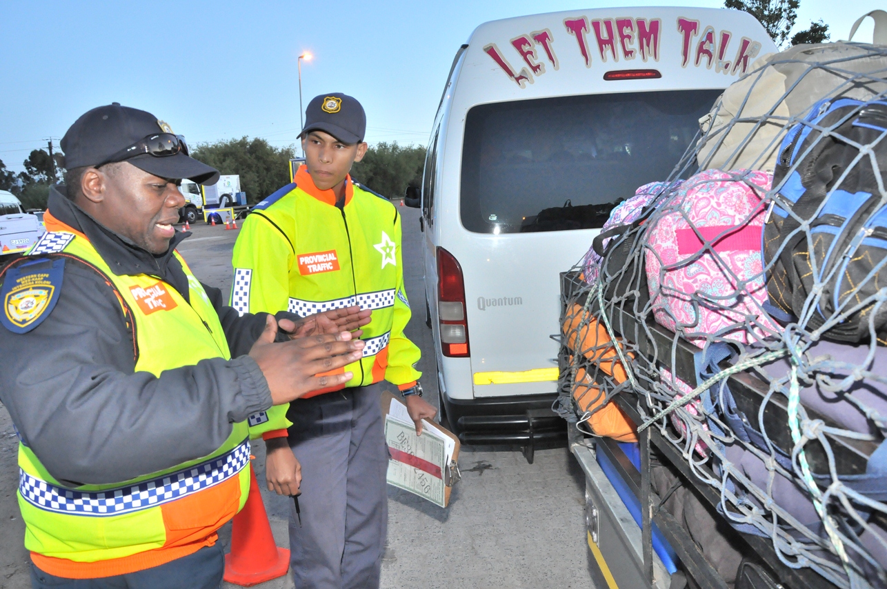 Keanon Cloete learns from experienced traffic officer Lunga Fuzani.