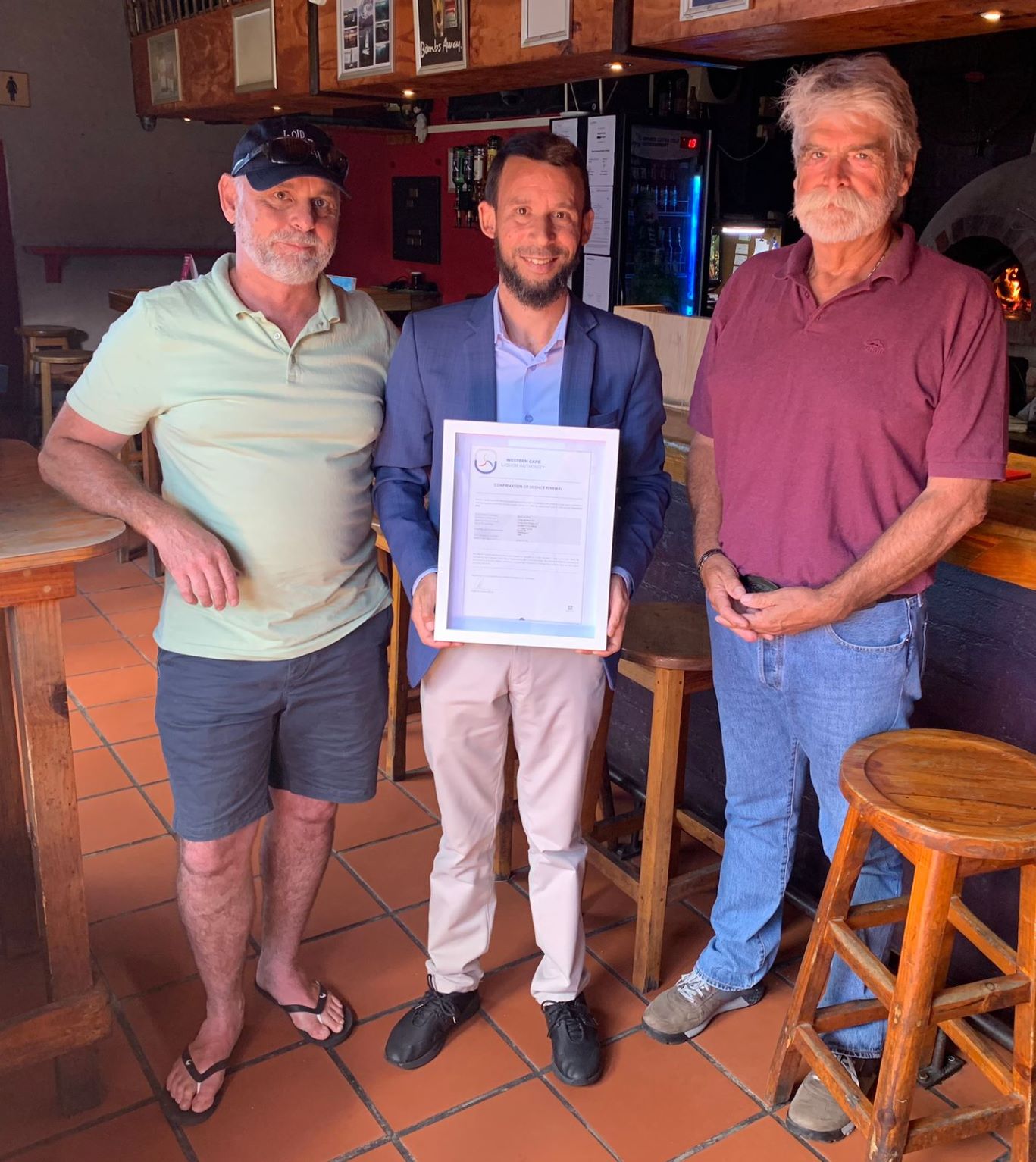 L-R: Manager of Barney’s in Hermanus, Mr David Williams, Western Cape Minister of Police Oversight and Community Safety, Reagen Allen and Owner of Barney’s in Hermanus, Mr Hendrik Baard