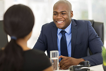 male conducting interview