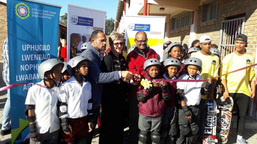 Minister Anroux Marais with excited children raring to test out the skatepark