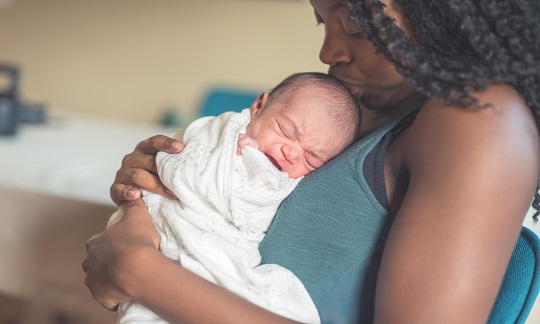 Mother holding baby