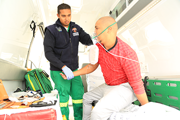 paramedics assisting patient