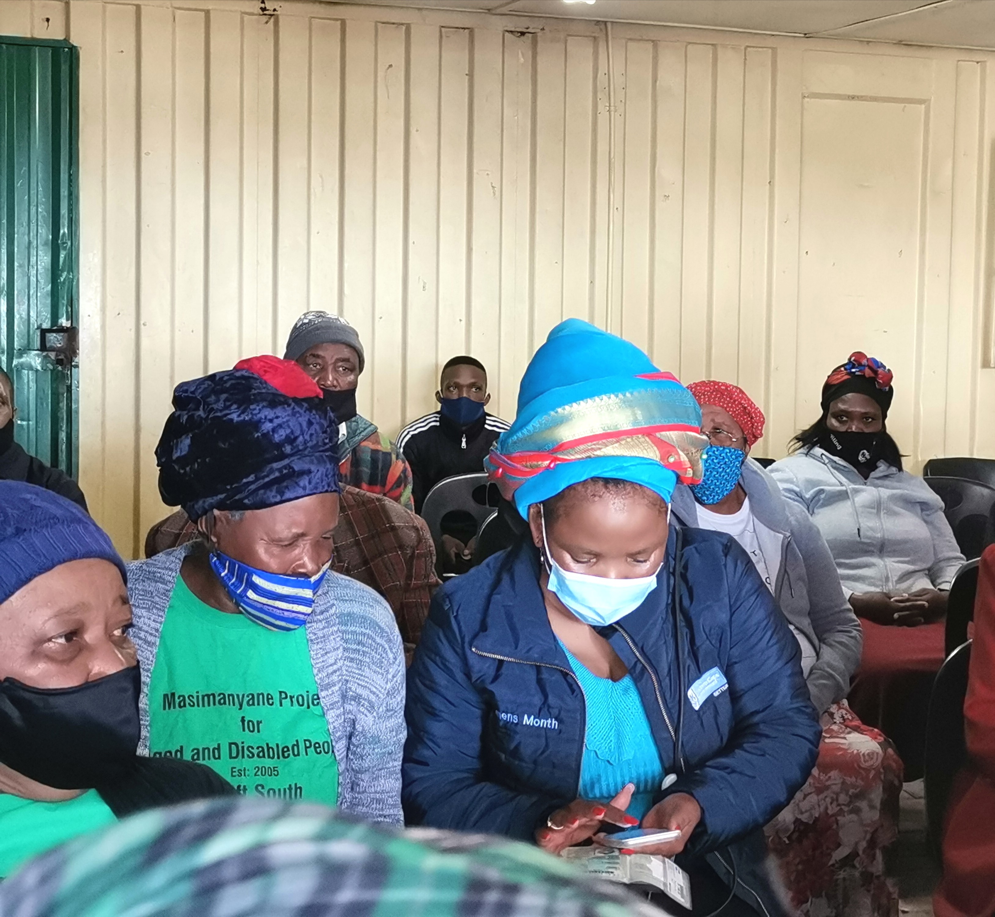 Dr Nomafrench Mbombo registers an elderly resident for the vaccine.