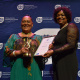 Abeedah Medell receiving her award from Jane Moleleki for Best Contribution to Performing Arts: Dance