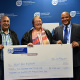 Hout Bay Museum receives their ceremonial cheque from Guy Redman