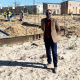 Western Cape Minister of Human Settlements, Tertuis Simmers with workers in the background