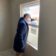 Western Cape Minister of Human Settlements, Tertuis Simmers inspecting one of the windows