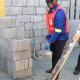 Minister Bonginkosi Madikizela joins the Nelson Mandela Day Initiative to build 100 homes for 100 families