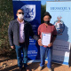 LR - Minister Simmers handing over title deeds to Slangrivier resident Mr Abraham September