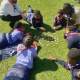 Minister Marais looks on while learners play the memory game