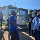 L-R : Vemensia Galant, Vuyisile Pauli Chairperson of Smutsville Informal Settlement Forum, Freegan Galant and Minister Tertuis Simmers 