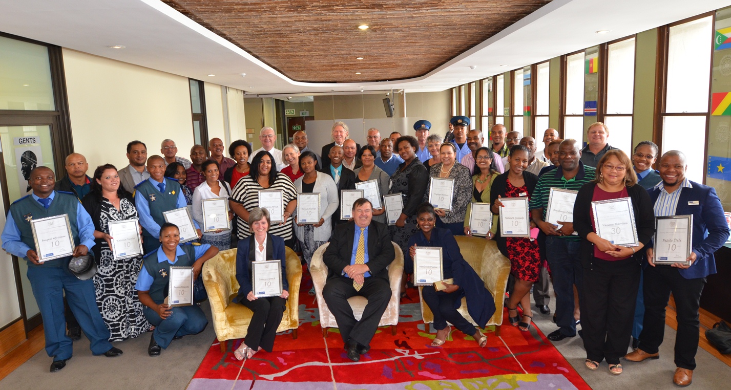 Minister Grant and Jacqui Gooch, Head of Department: Transport and Public Works with Long Service Awards recipients.