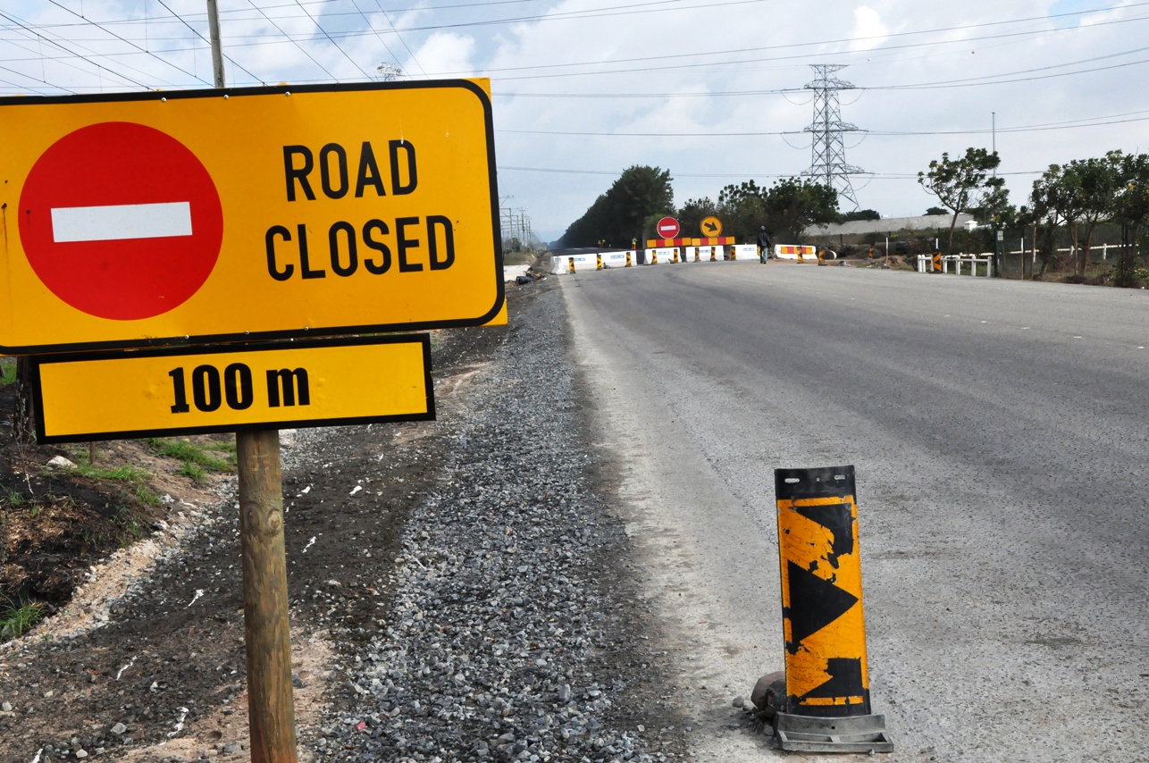 The road is currently closed to through traffic.