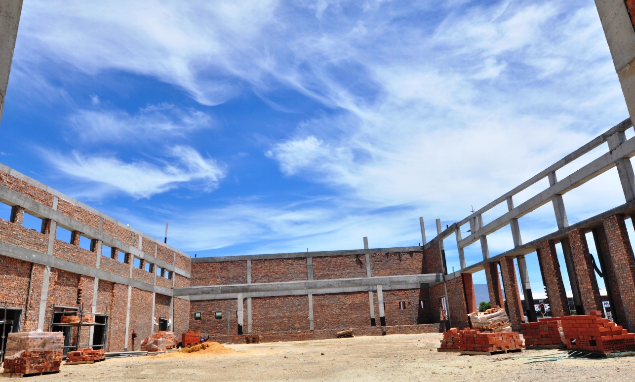  The school hall under construction.