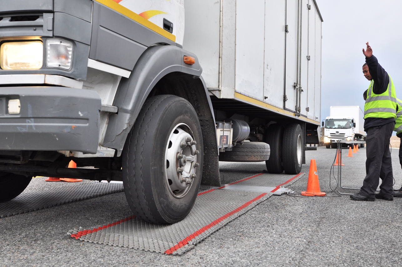 Weighbridge operator Nigel Adams conducts a roadside screening.