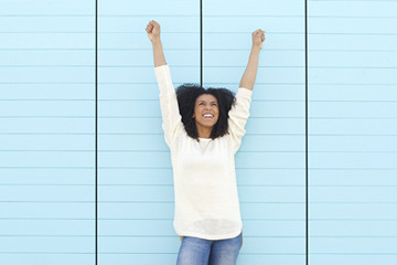 Woman raising arms