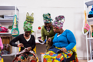 Female entrepreneurs checking info on the tablet