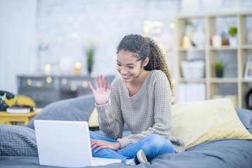 A young lady video calling